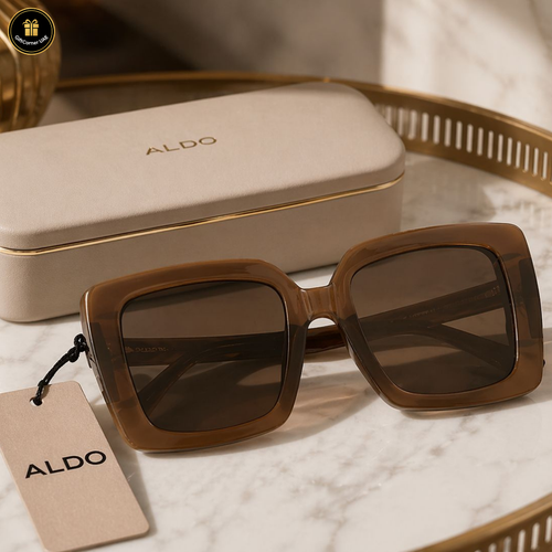 Brown sunglasses with ALDO case and tag on a marble surface