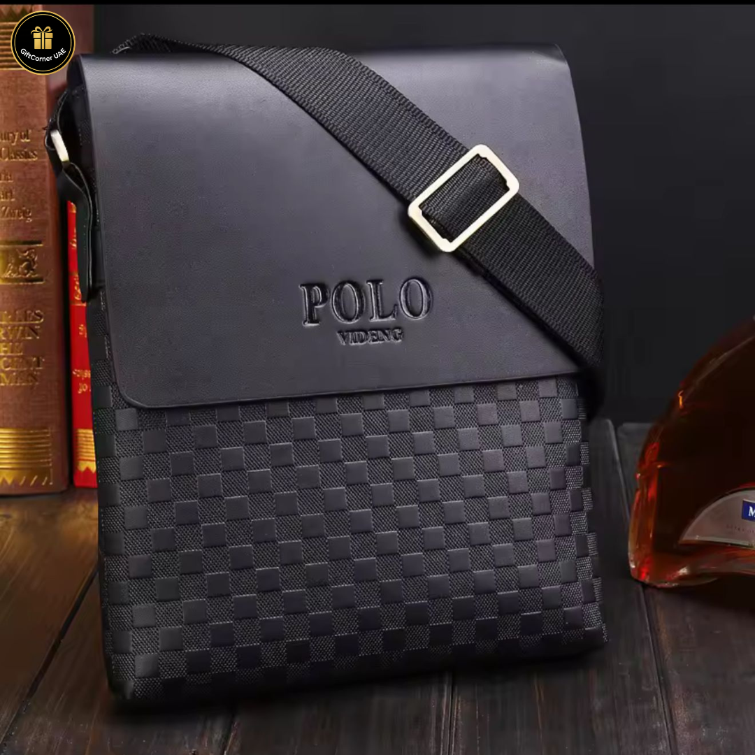 Black leather shoulder bag with woven pattern and 'POLO' branding on a wooden surface.